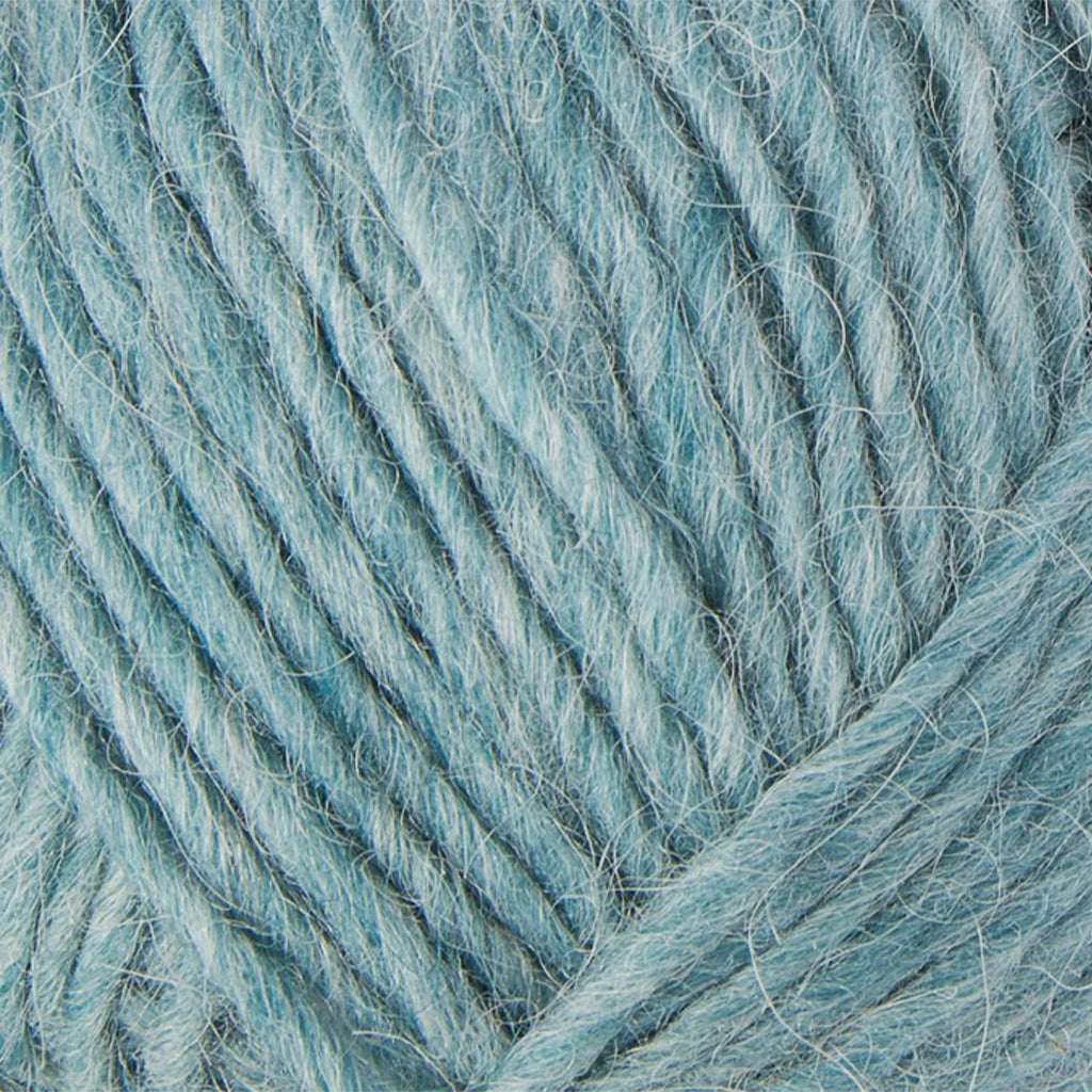 Arctic Exposure 1232, a pale icy blue skein of Lopi's Álafosslopi, a bulky Icelandic wool yarn.