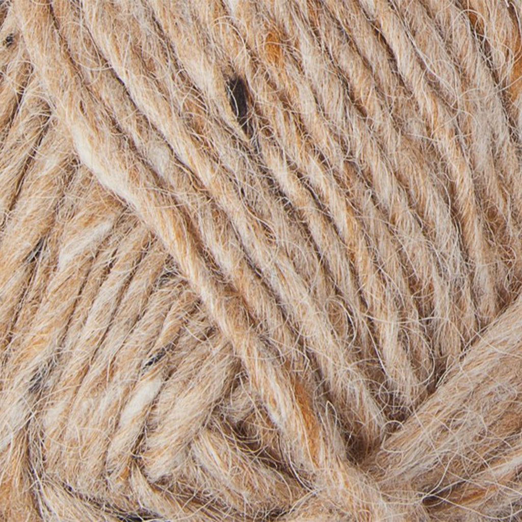 Beige Tweed 9976, a warm beige tweed skein of Lopi's Álafosslopi, a bulky Icelandic wool yarn.