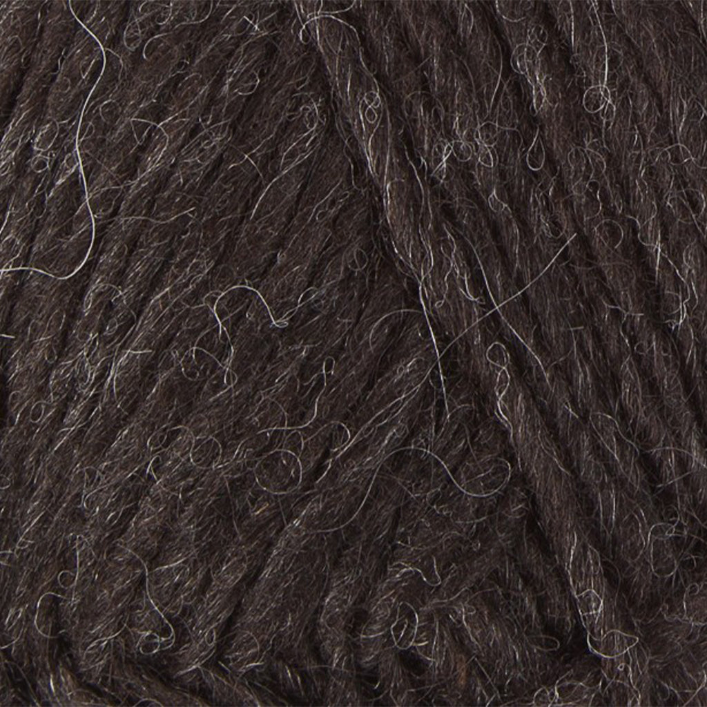 Black Sheep 0052, a natural heathered black skein of Lopi's Álafosslopi, a bulky wool yarn.
