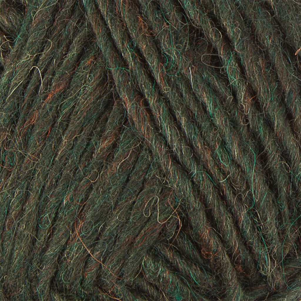 Cypress Green 9966, a dark heathered forest green skein of Lopi's Álafosslopi, a bulky wool yarn.