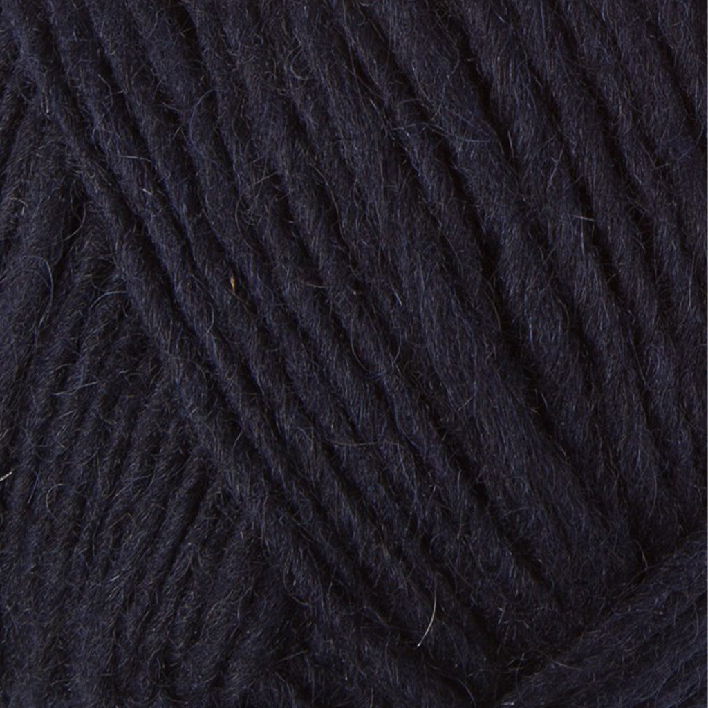 Midnight Blue 0709, a dark night sky blue skein of Lopi's Álafosslopi, a bulky Icelandic wool yarn.