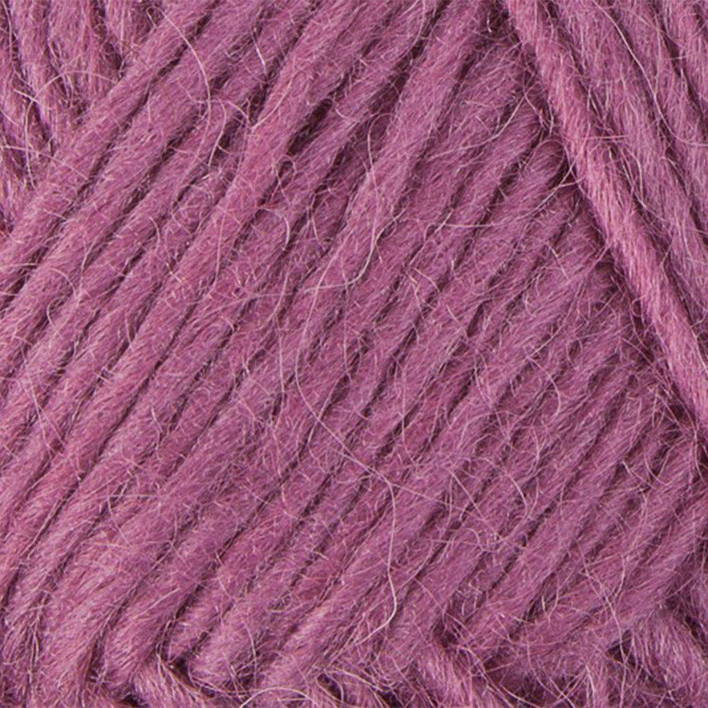 Orchid 0159, a dusty pink skein of Lopi's Álafosslopi, a bulky Icelandic wool yarn.