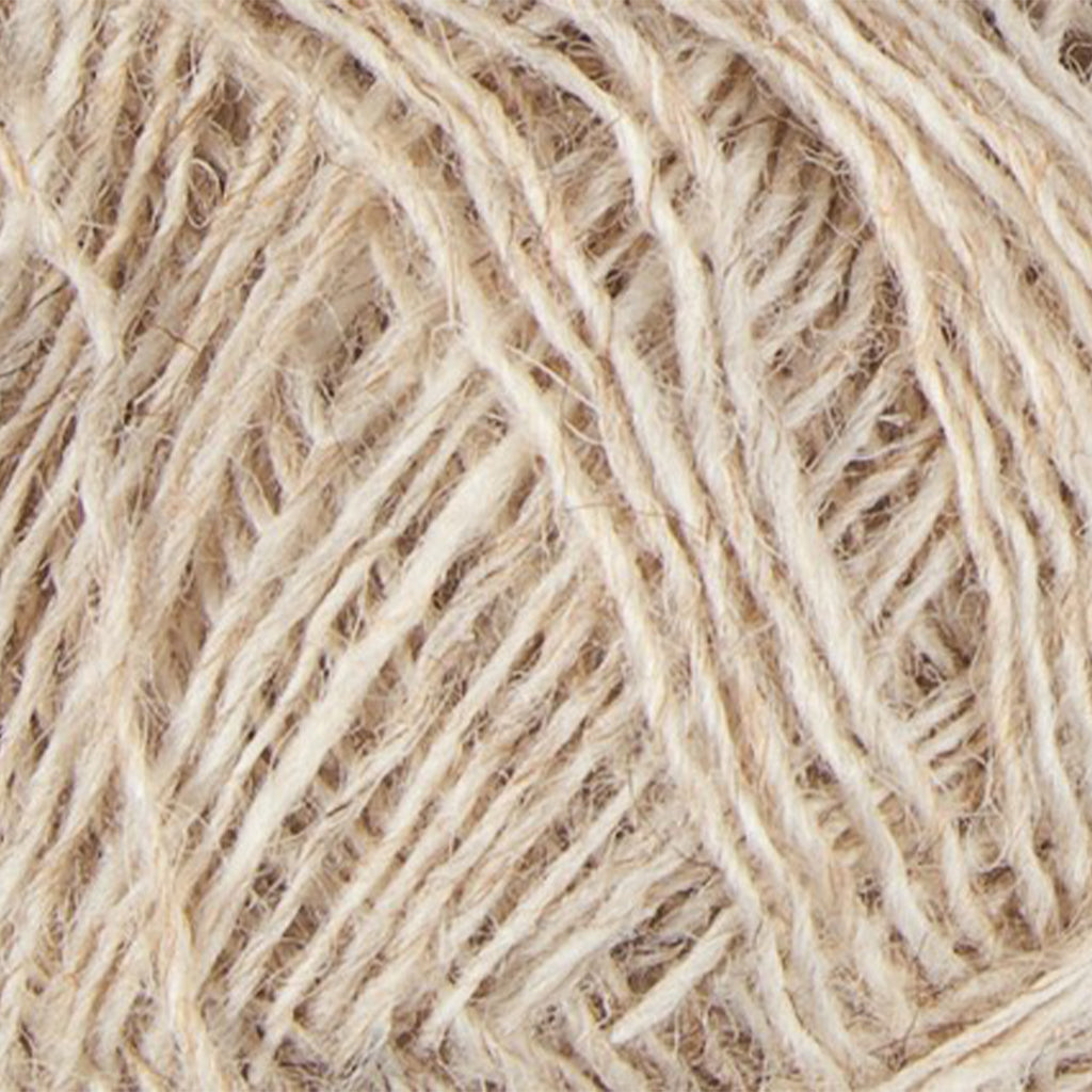 Beige 1038, a light beige skein of Lopi's Einband Icelandic wool lace yarn.