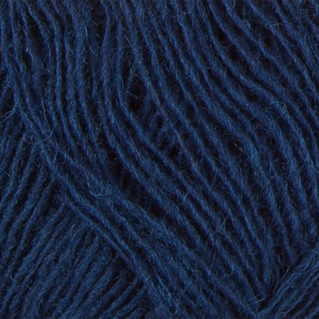 Blue 0942, a rich blue skein of Lopi's Einband Icelandic wool lace yarn.