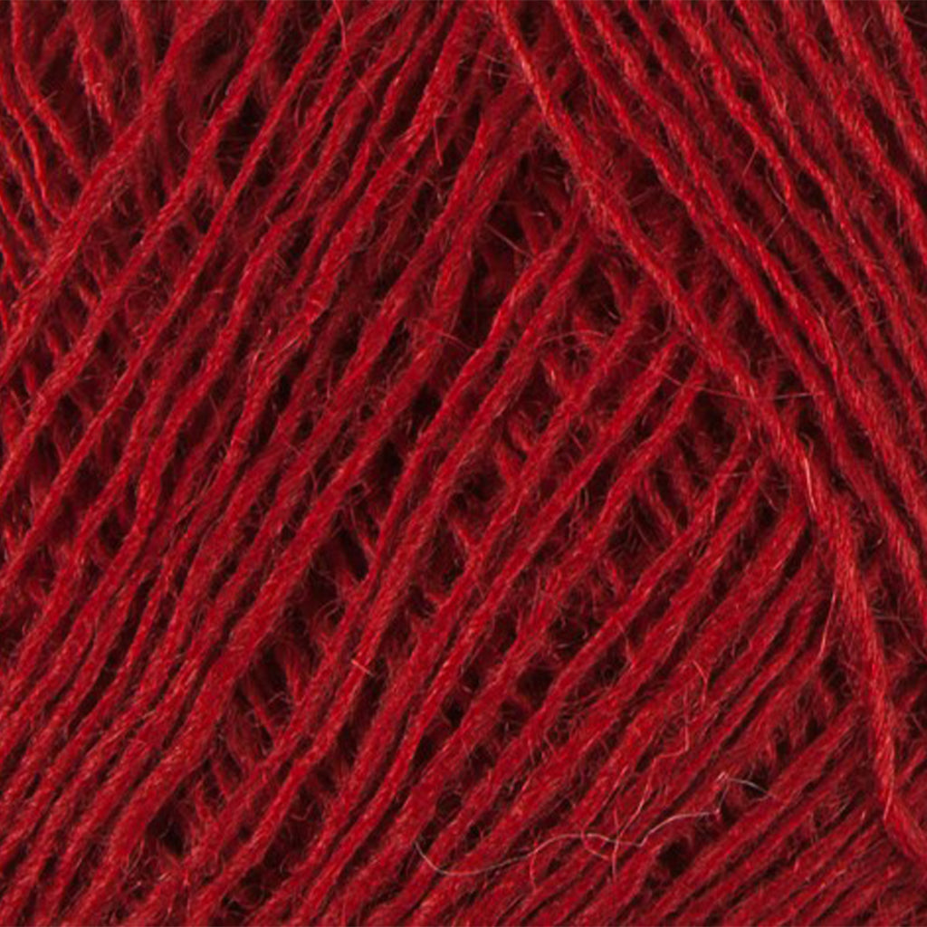Cardinal 9009, a dark saturated red skein of Lopi's Einband Icelandic wool lace yarn.