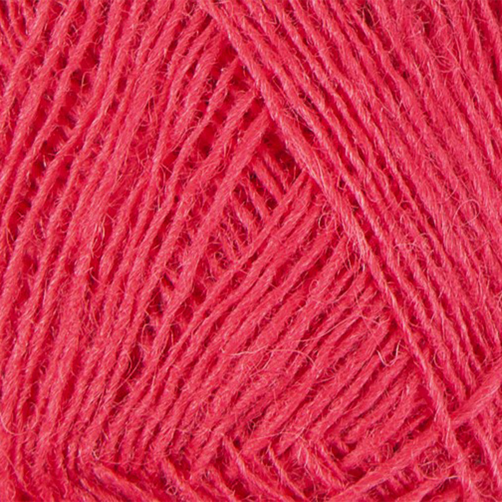 Cherry 1769, a pink skein of Lopi's Einband Icelandic wool lace yarn.