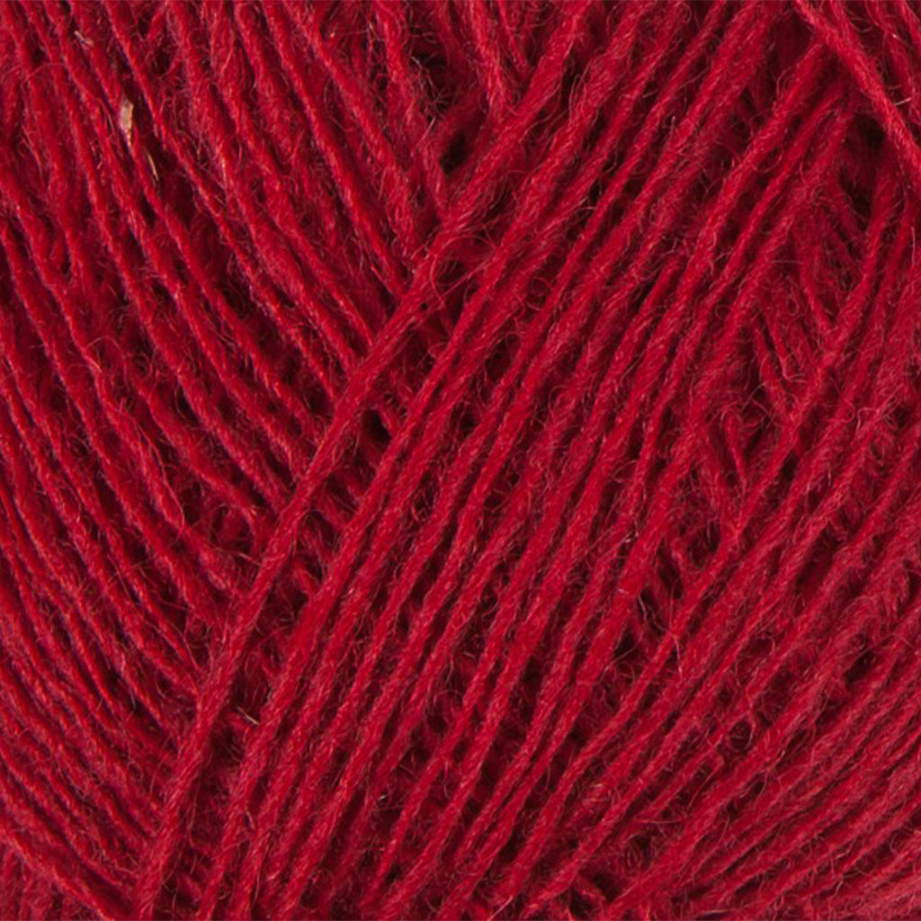 Crimson 0047, a deep red skein of Lopi's Einband Icelandic wool lace yarn.