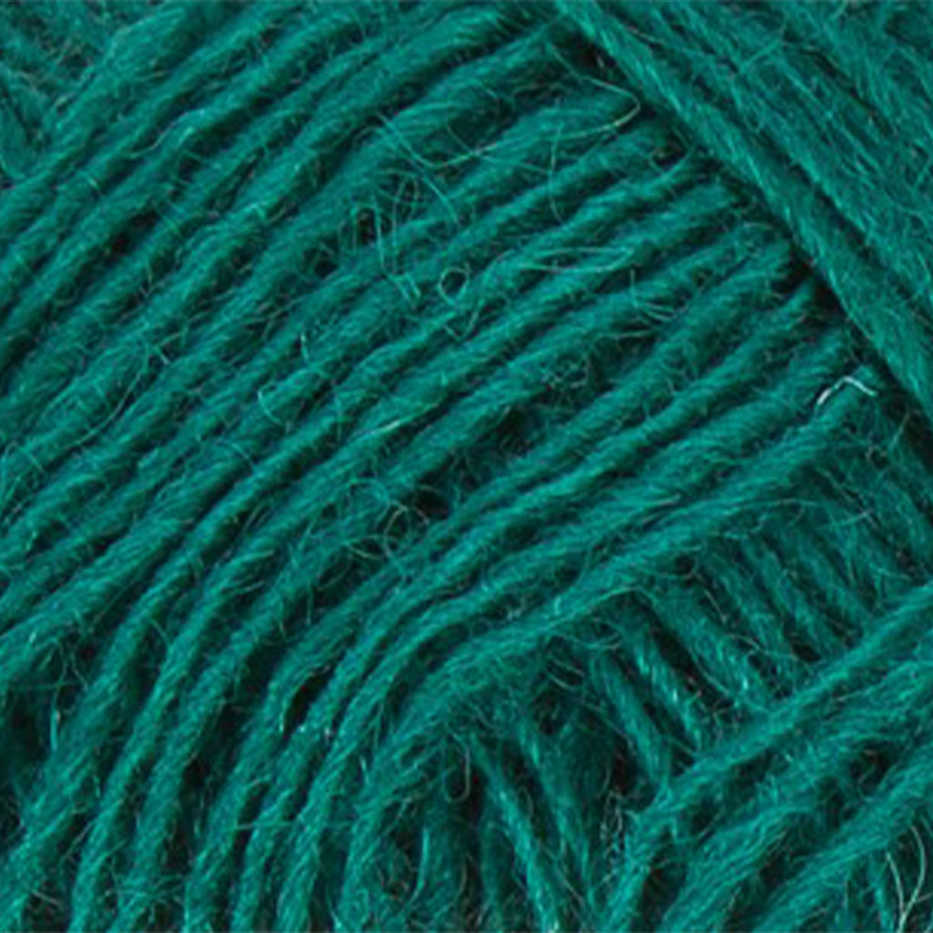 Green 1763, an emerald green skein of Lopi's Einband Icelandic wool lace yarn.