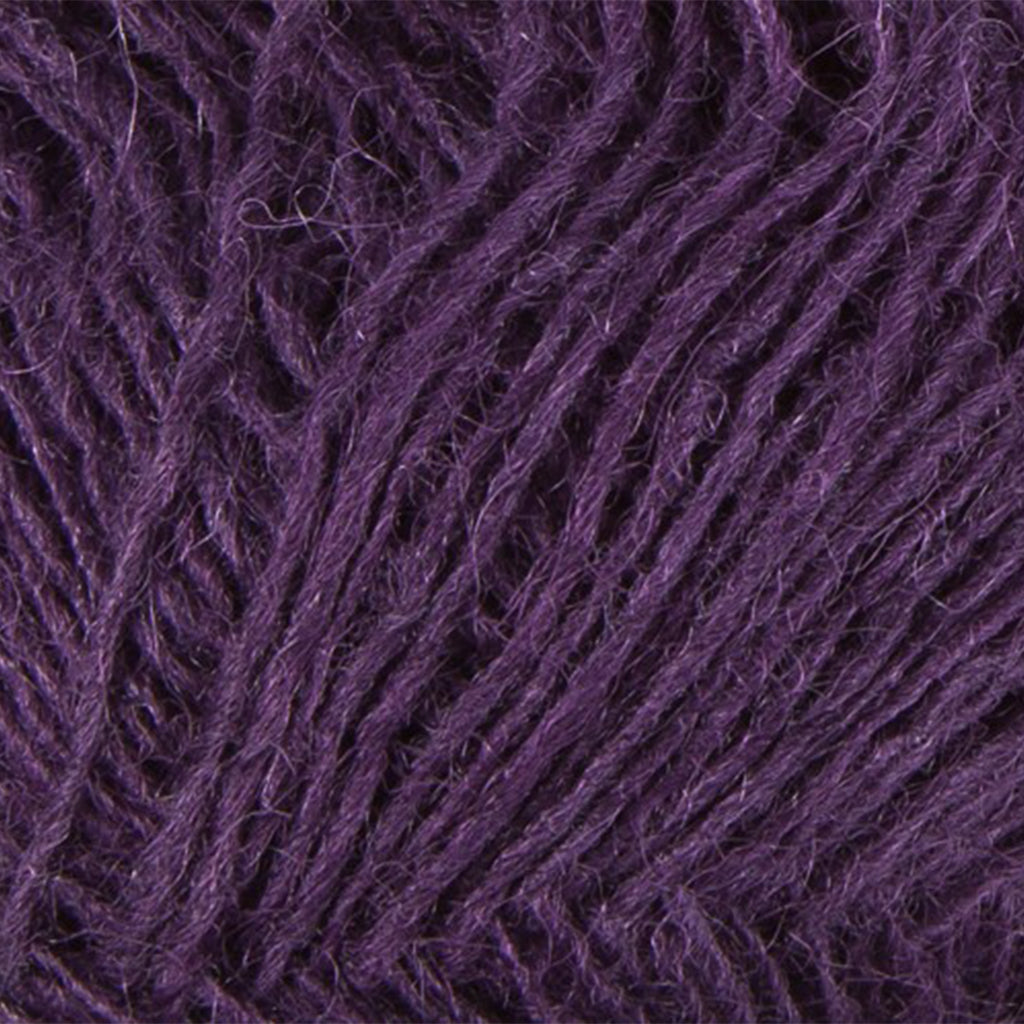 Plum 9132, a warm, dark purple skein of Lopi's Einband Icelandic wool lace yarn.
