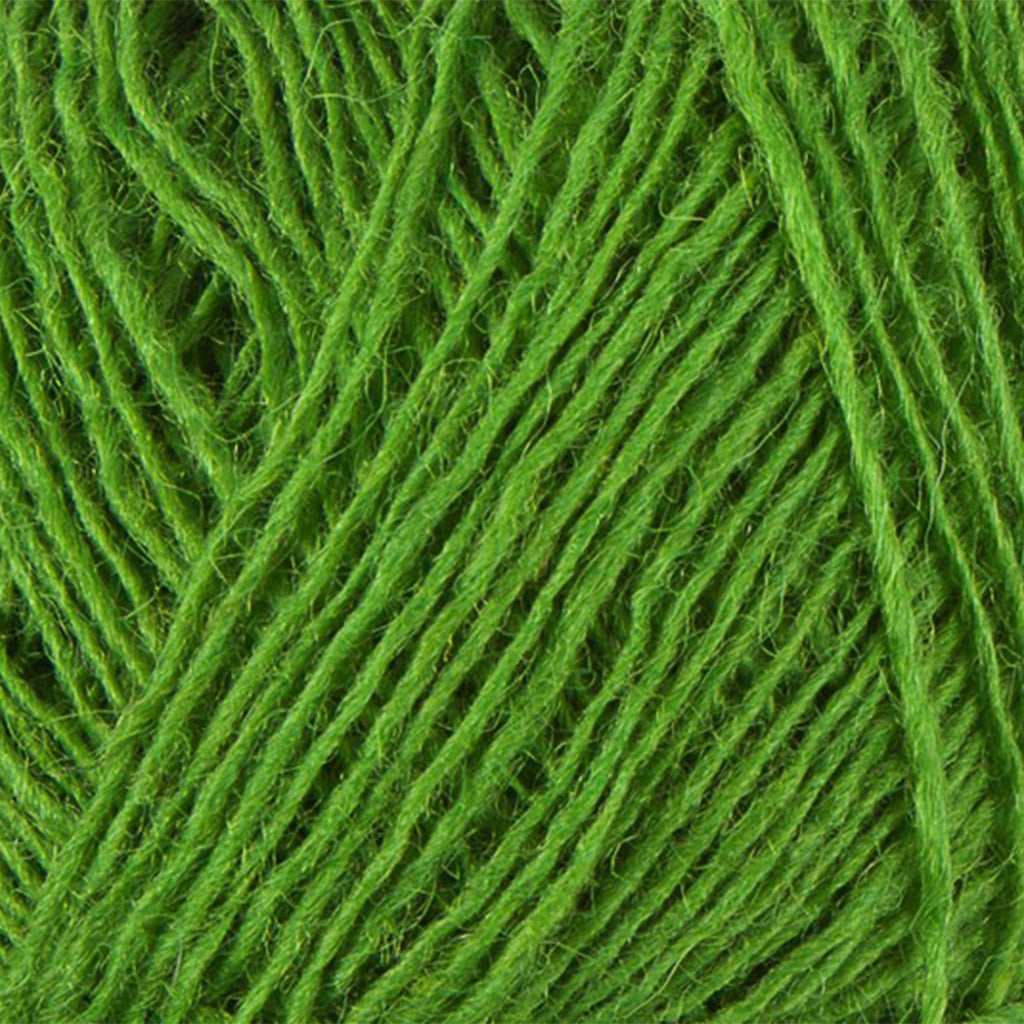 Vivid Green 1764, an electric spring green skein of Lopi's Einband Icelandic wool lace yarn.