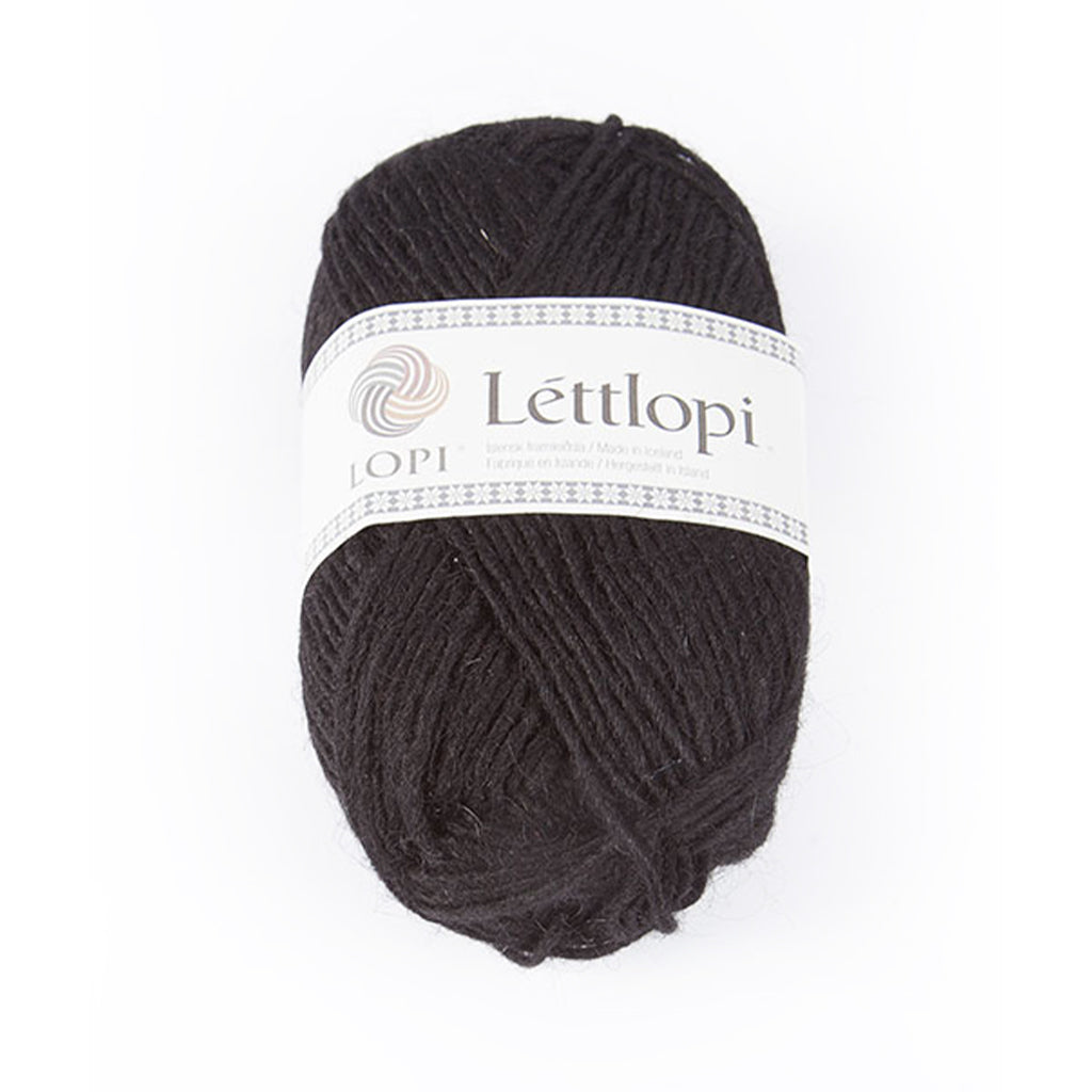 Black 0059, a solid black skein of Léttlopi Icelandic wool yarn.