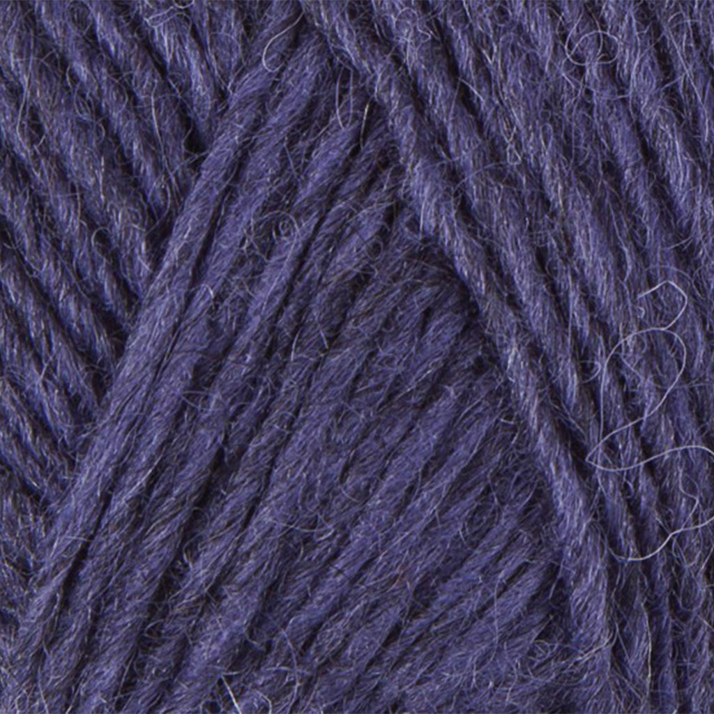 Grape 9432, a dark heathered purple skein of Léttlopi Icelandic wool yarn.