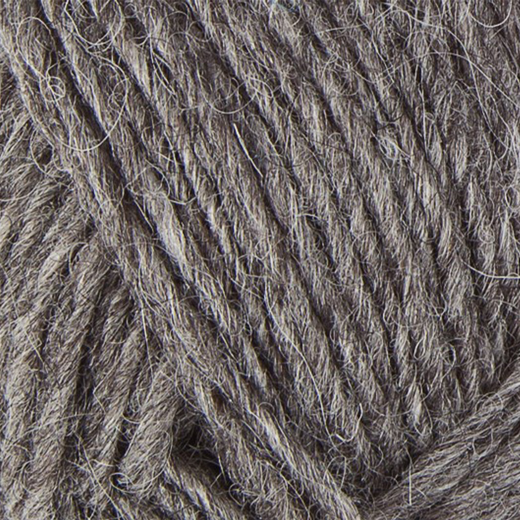 Grey 0057, a medium heathered grey skein of Léttlopi Icelandic wool yarn.