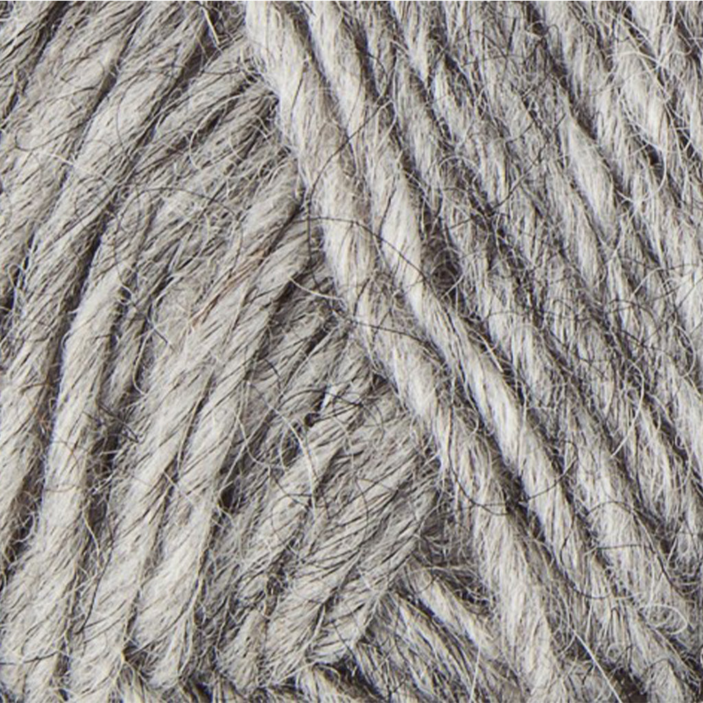 Light Grey 0056, a light heathered grey skein of Léttlopi Icelandic wool yarn.