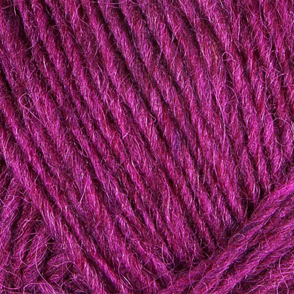 Royal Fuchsia 1705, a vibrant pinkish purple skein of Léttlopi Icelandic wool yarn.