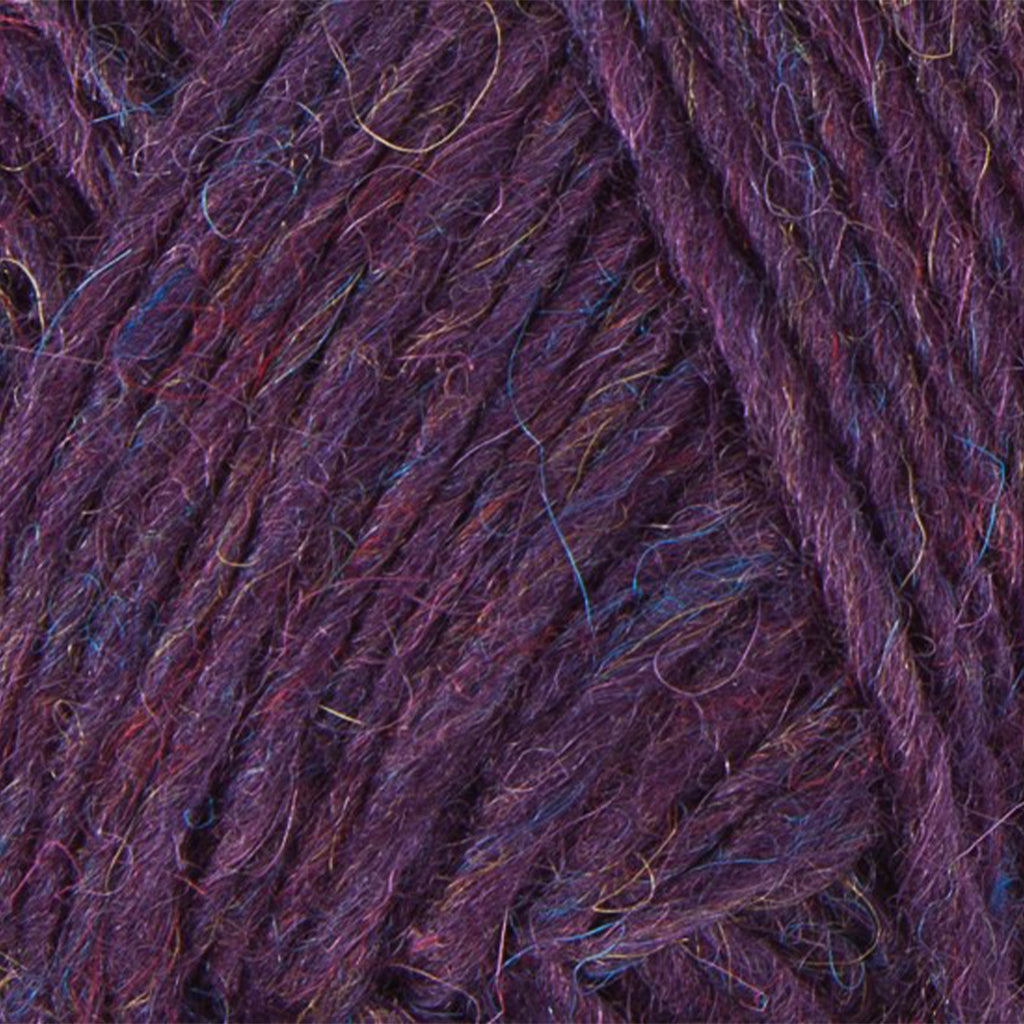 Violet 1414, a heathered purple skein of Léttlopi Icelandic wool yarn.
