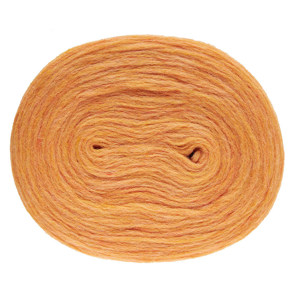 Golden Blush 2028, a warm heathered peach colored roll of Lopi's Plotulopi.