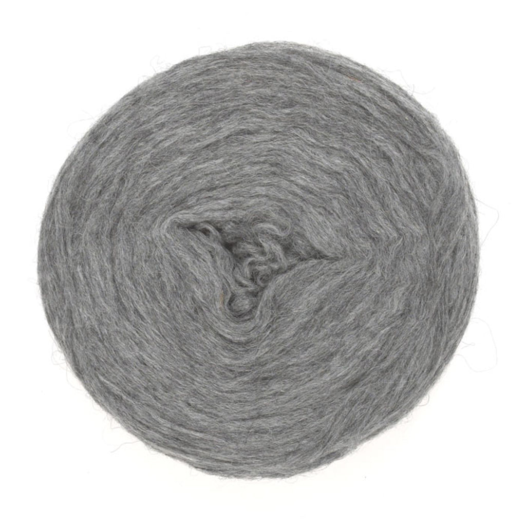 Grey 9102, a medium heathered grey roll of Lopi's Plotulopi.
