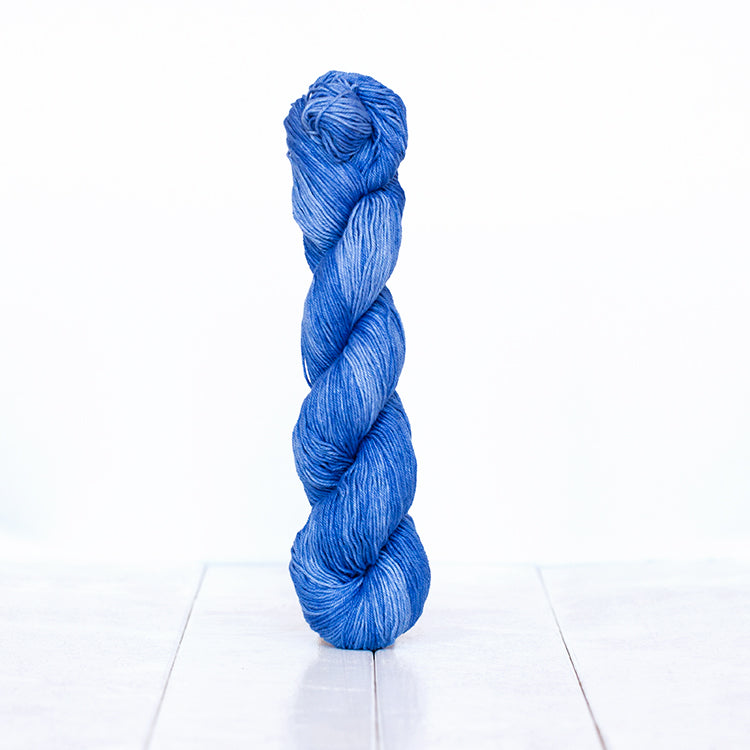 1215, a true blue skein of Urth Yarn's hand-dyed Monokrom Cotton DK weight yarn.