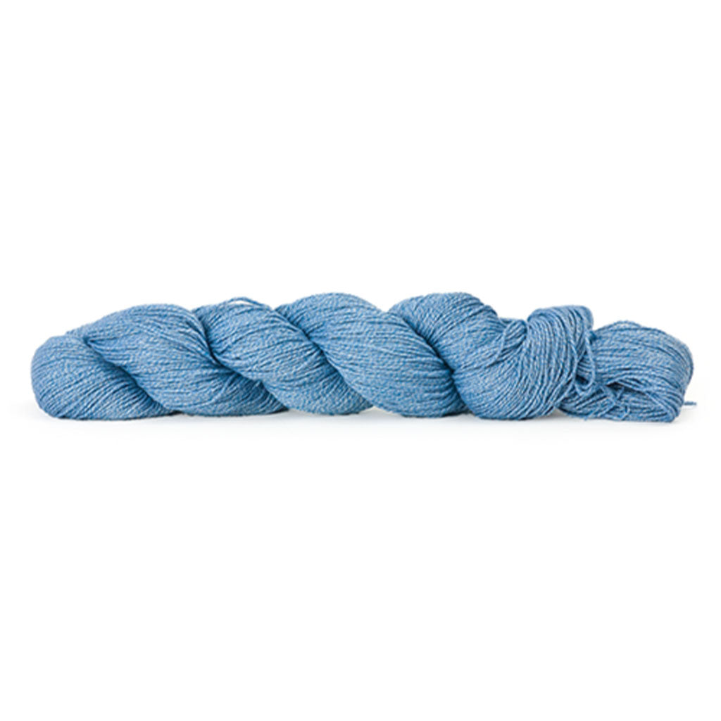 HiKoo's Popcycle yarn in the color Beaming 3010, a sky blue marled with white.