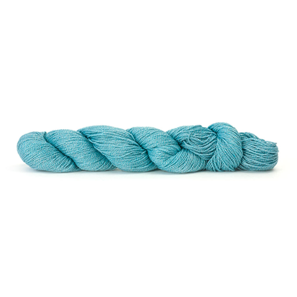HiKoo's Popcycle yarn in the color Bubbly 3011, a cyan blue marled with white.
