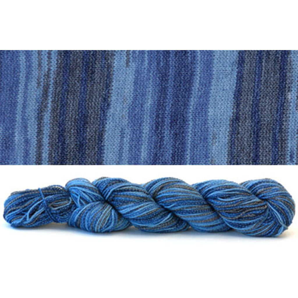 CoBaSi fingering in the color Wave Caps 814, a self-striping colorway with grey and blue stripes.