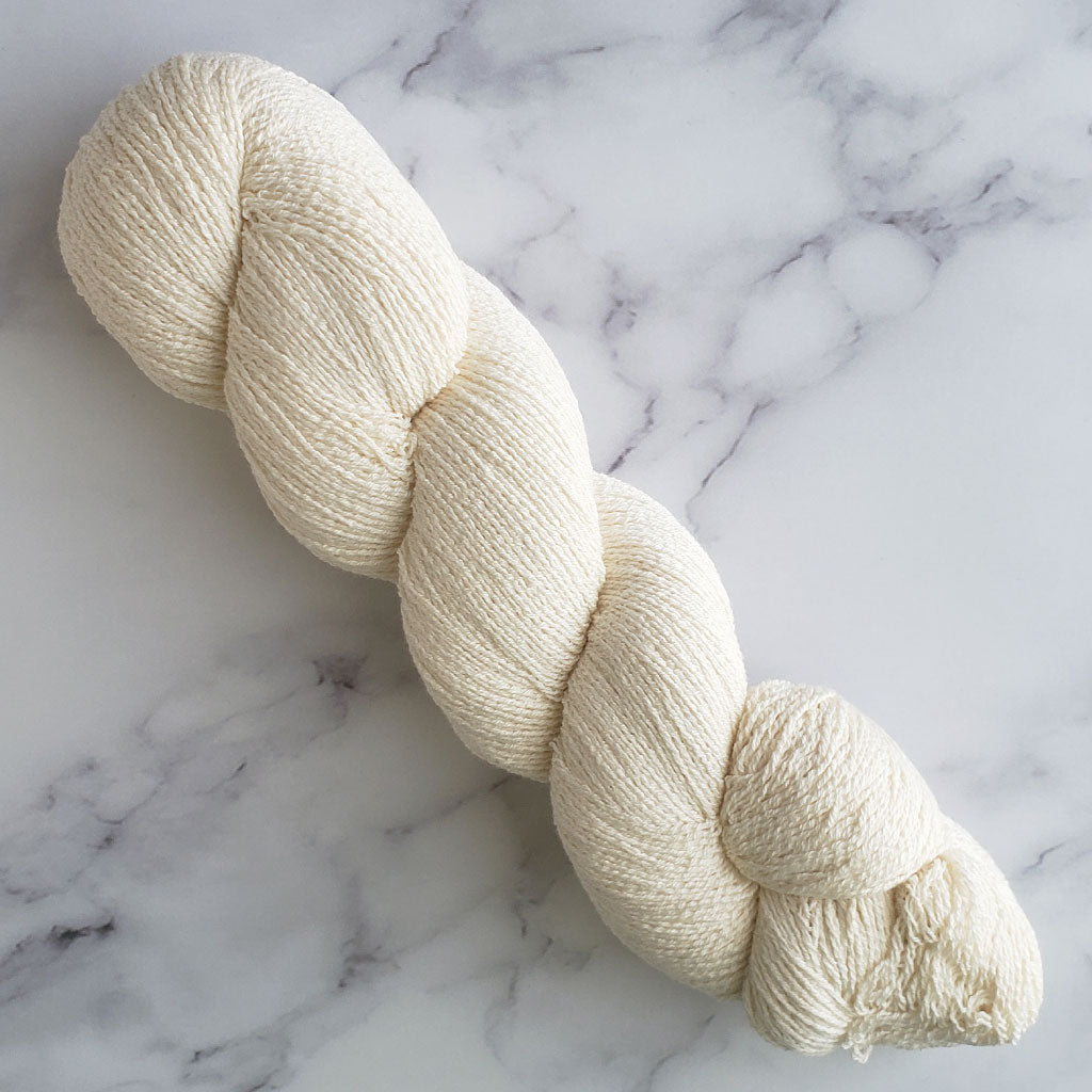 1 100 gram skein of undyed HiKoo CoBaSi yarn.