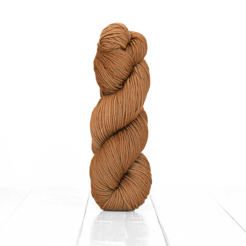 Color Walnut, hand-dyed skein of yarn, light cool brown color produced from natural walnuts.