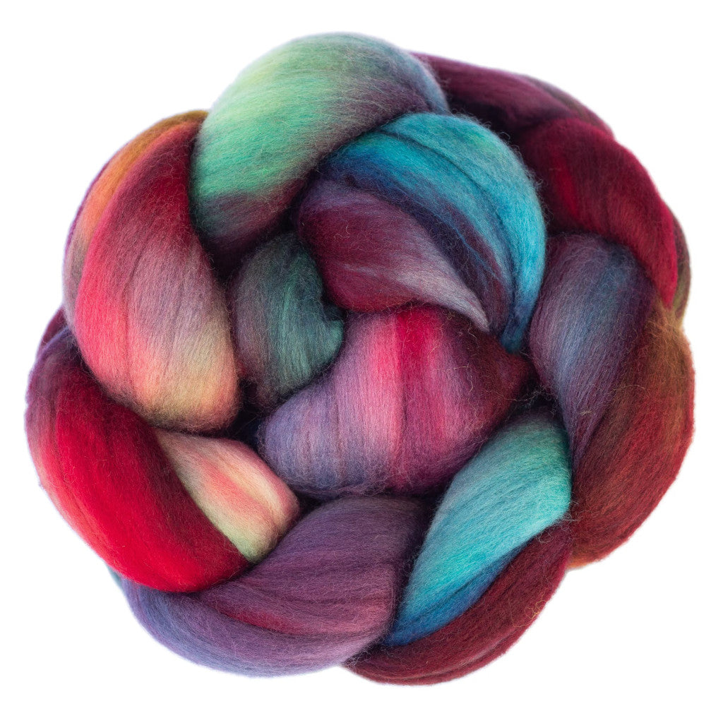 Color 685 Camaleon - a hand dyed merino top in shades of sea green, light blue, orange, purple and red