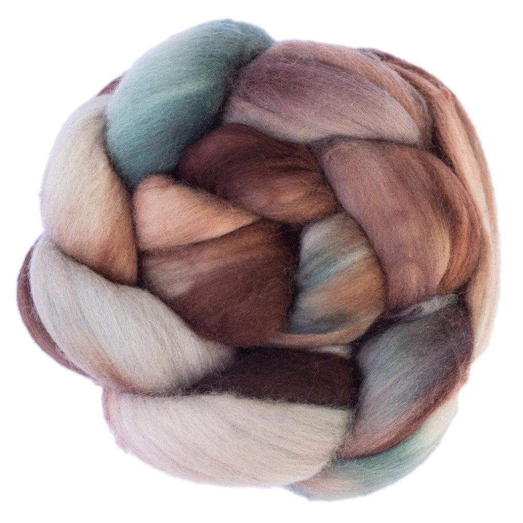 Color 659 Corteza - a hand dyed merino top in shades of brown, teal and white.