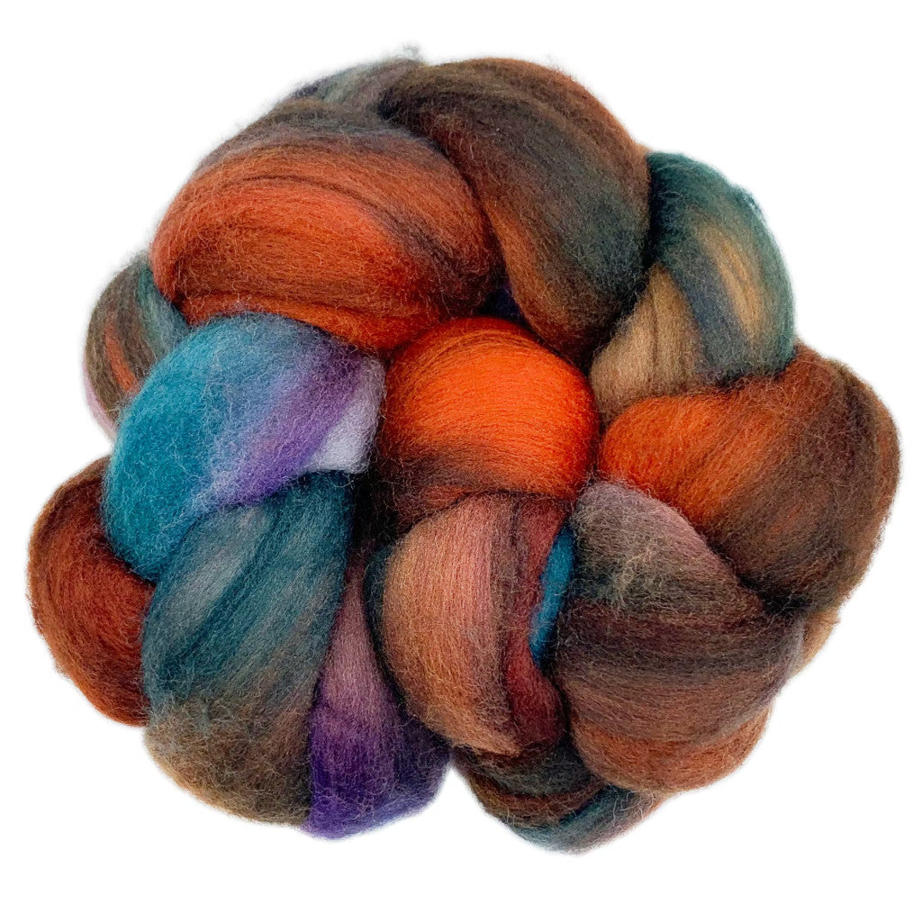 Color 121 Marte - a hand dyed merino top in shades of teal, orange, purple and brown.
