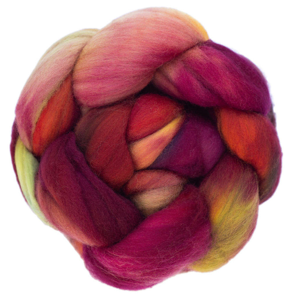 Color 248  Petrichor - a hand dyed merino top in shades of magenta, orange and yellow