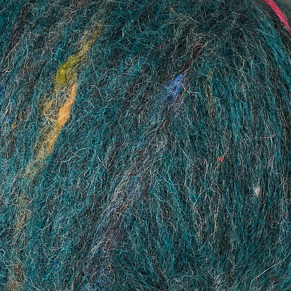 Emerald 3246, a speckled green-blue ball of Berroco's Mochi yarn.