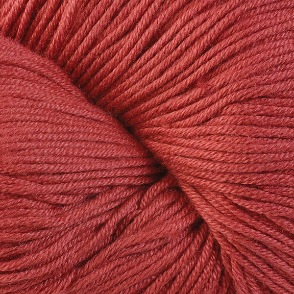 Bellevue 6646, a dusty orange red skein of Berroco's DK weight Modern Cotton.