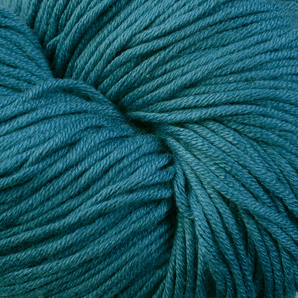 Lincoln Woods 1642, a dark blue spruce colored skein of Berroco's worsted weight Modern Cotton.