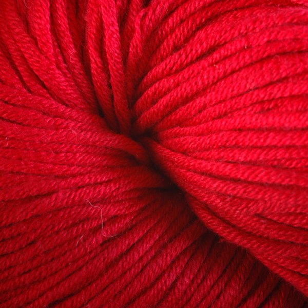 Rhode Island Red 1650, a bright red skein of Berroco's worsted weight Modern Cotton.