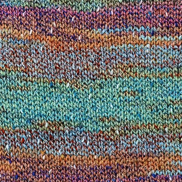 Zeppole 7459. A self-striping yarn with summery shades of blue, orange, and pink.