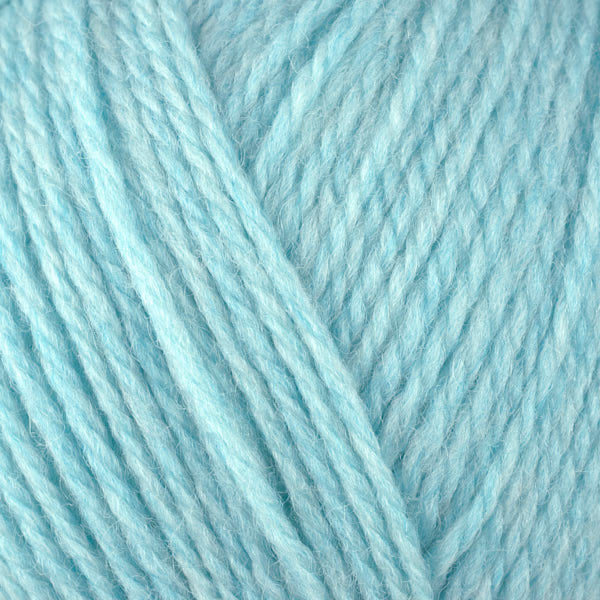 Breeze 83163, a light, bright, heathered blue skein of washable DK weight Ultra Wool yarn.