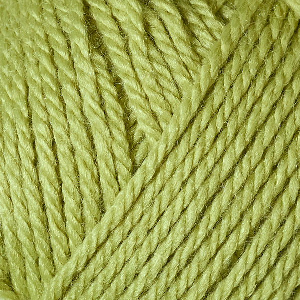Berroco's Vintage Baby DK yarn in the color New Leaf 10024, a bright yellowish green.