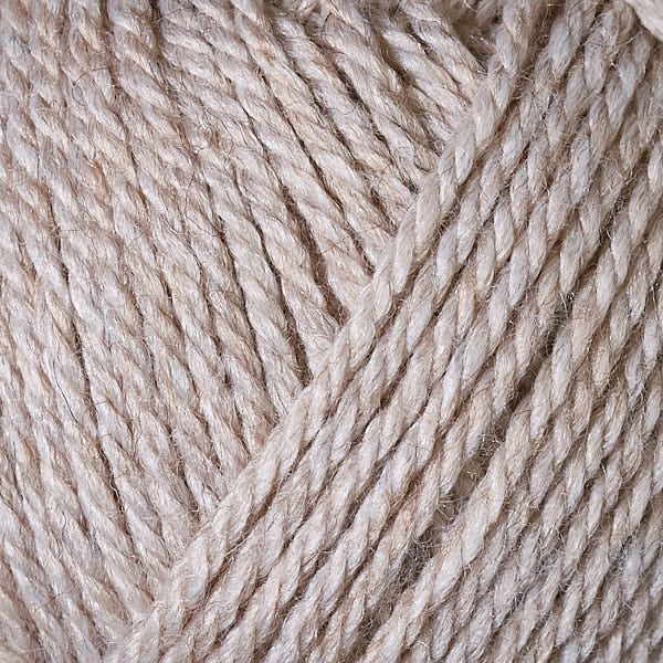 Berroco's Vintage Baby DK yarn in the color Toast 10072, a heathered oatmeal.