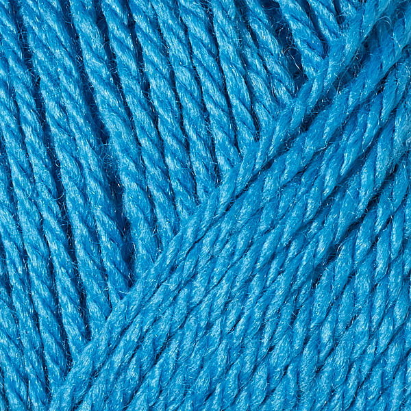 Berroco's Vintage Baby DK yarn in the color Turquoise 10021, a vibrant turquoise blue.