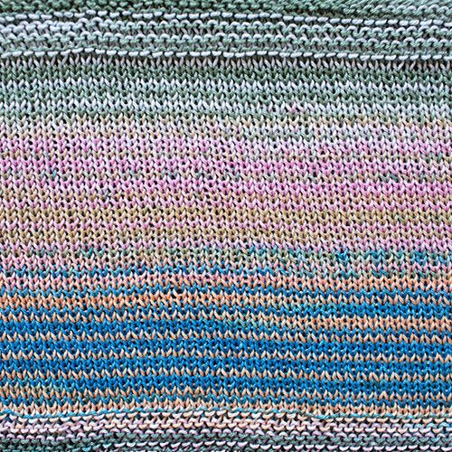 A swatch of Uneek Cotton in the colorway 1092, stripes in shades of pinks, greys, and blues.