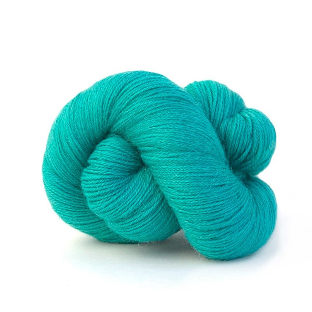Caribbean 350: A twisted hank of Kelbourne Woolens Perennial Fingering yarn in a bright aqua teal