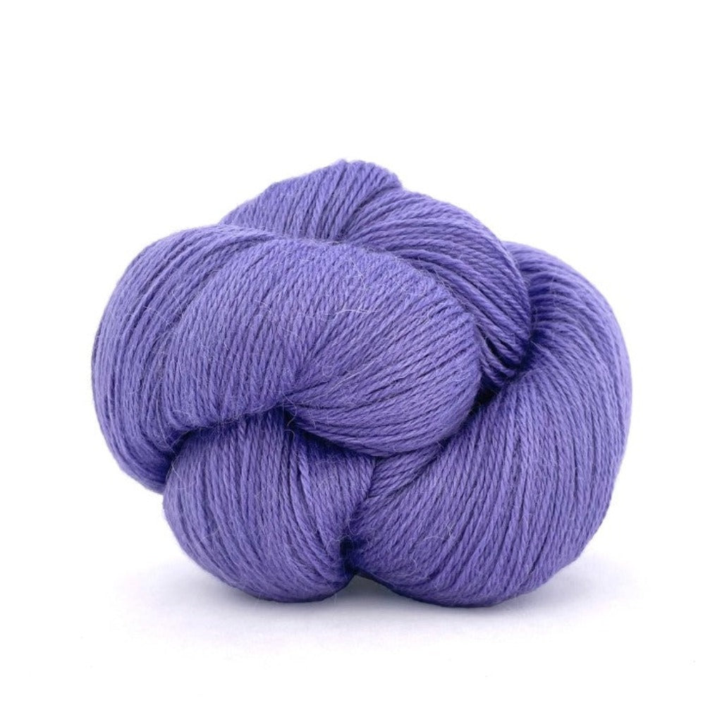 Cornflower 550:  A twisted hank of Kelbourne Woolens Perennial Fingering yarn in a light purple 