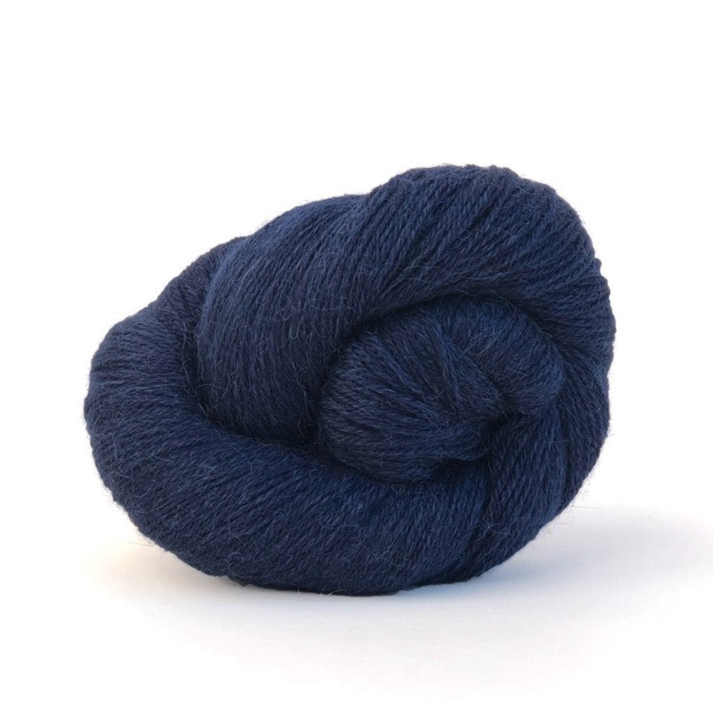Midnight 414:  A twisted hank of Kelbourne Woolens Perennial Fingering yarn in a deep navy color