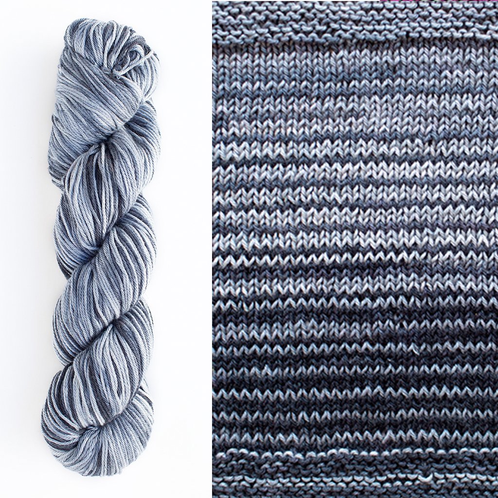 Color 1076: a hand-dyed, self-striping cotton yarn with black, grey, and white shades.