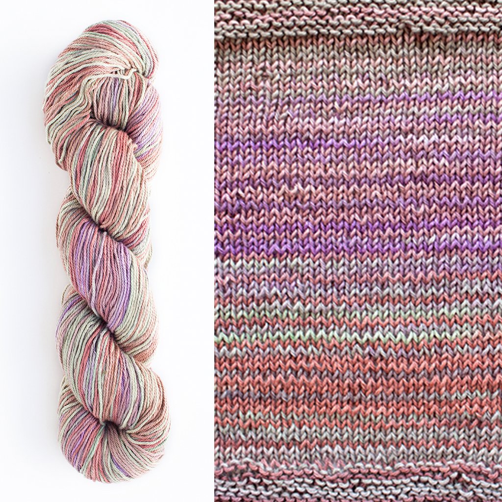 Color 1077: a hand-dyed,  self-striping cotton yarn with tan, pink, coral, and light green shades