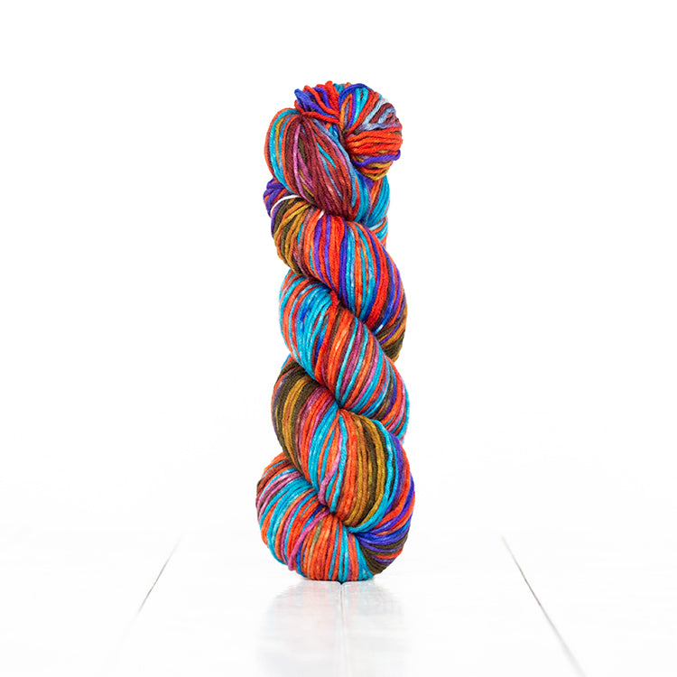 Color 6007, hand-dyed yarn in self-striping shades of red, orange, & brown with a little blue.