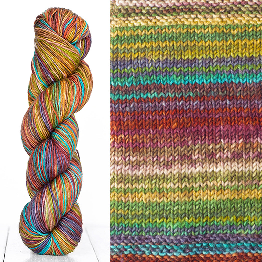 Color 3002: a hand-dyed skein of self striping wool yarn with yellow, red, white, and blue shades