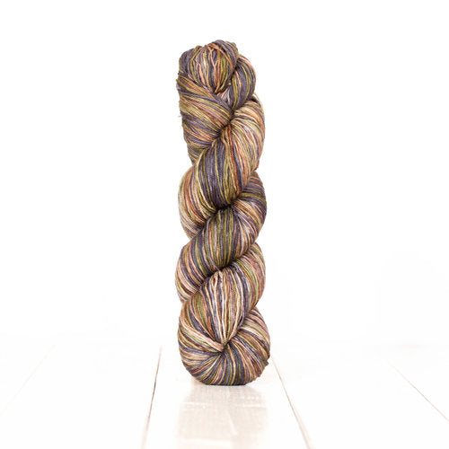Color 3006: a hand-dyed self-striping wool yarn with brown, off-white, grey, and tan shades.